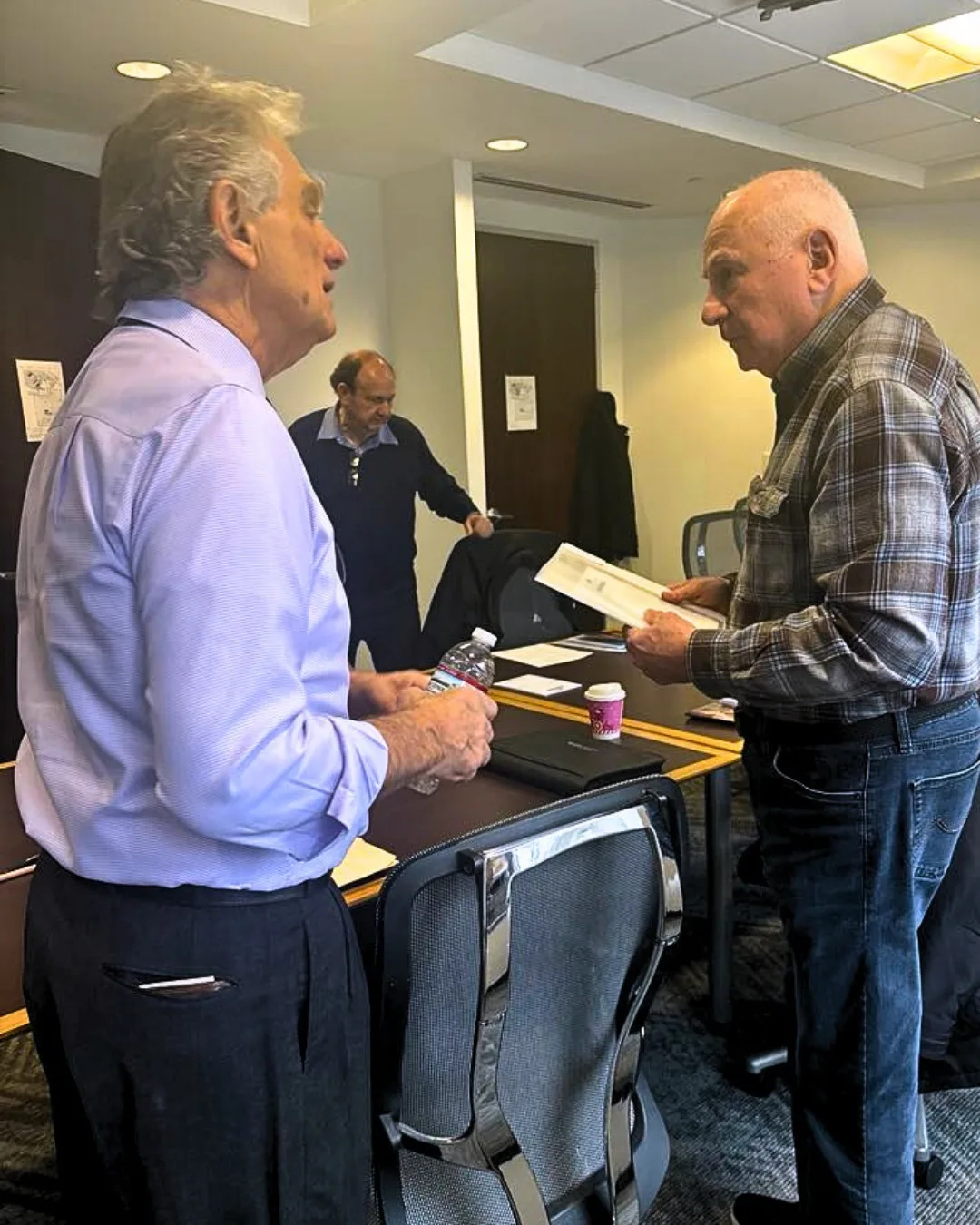 Paul in a personal conversation with an attendee