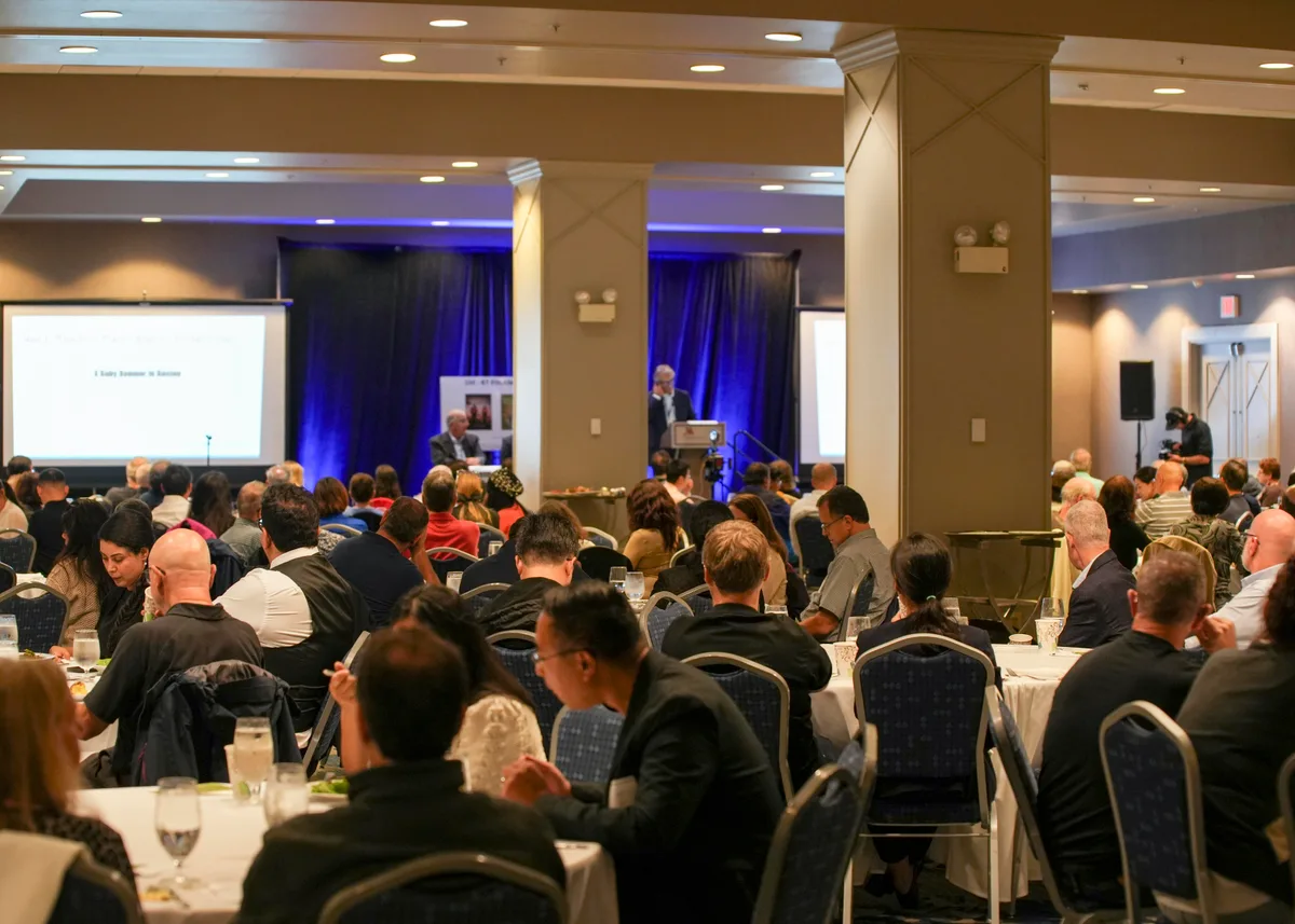 Paul Mauro speaking to a packed seminar audience