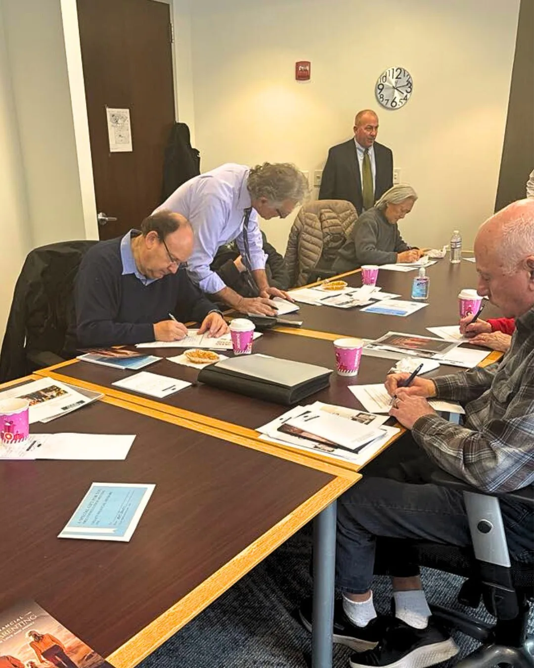 Attendees at Paul's financial workshop